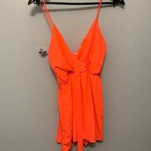 This pink jumpsuit also comes with a strap to tie around waist